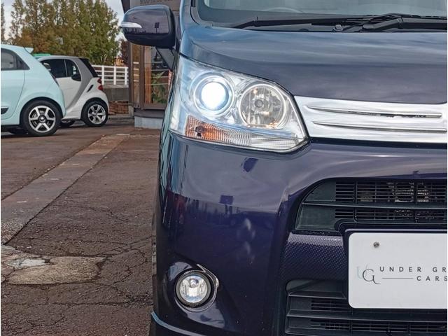 ムーヴ カスタム　ＲＳ　４ＷＤ　ターボ　ダイハツ純正１４インチＡＷ　スマートキー　ｍｏｍｏステアリング　オートエアコン　シート洗浄済み　純正ＨＩＤ　純正フォグ（8枚目）