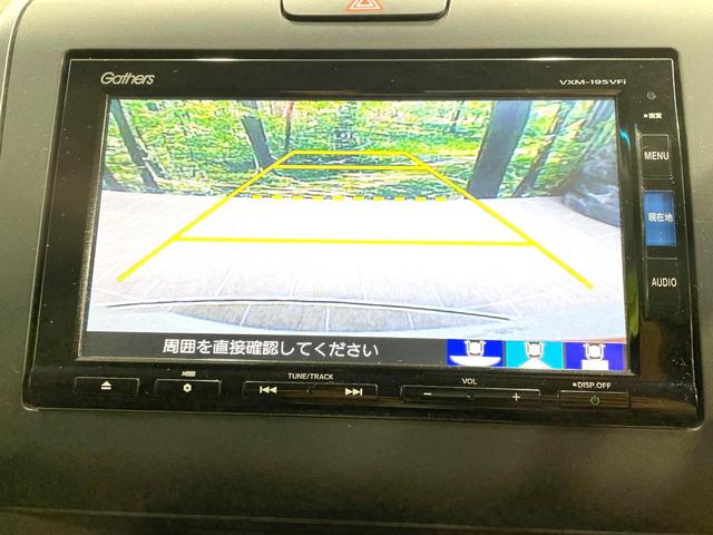 フリードハイブリッド ハイブリッド・EX 両側電動ドア 純正SDナビ バックカメラ 衝突被害軽減システム レーダークルーズ 禁煙車 ハーフレザーシート ドラレコ スマートキー LEDヘッド ビルトインETC 車線逸脱警報 オートライト(5枚目)