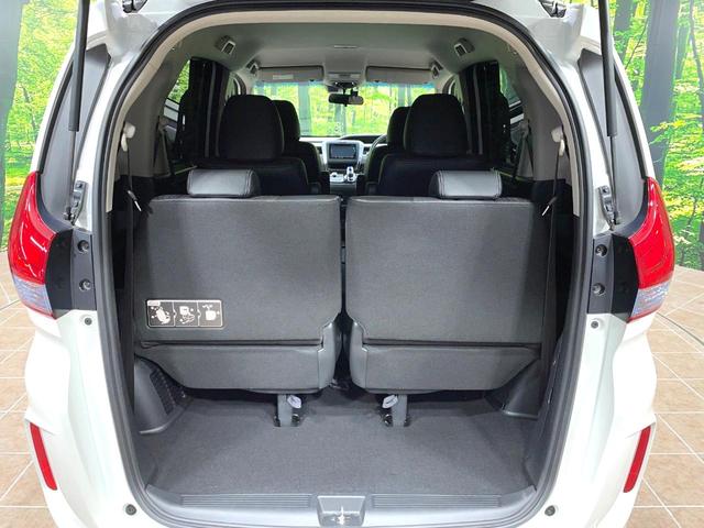 フリードハイブリッド ハイブリッド・EX 両側電動ドア 純正SDナビ バックカメラ 衝突被害軽減システム レーダークルーズ 禁煙車 ハーフレザーシート ドラレコ スマートキー LEDヘッド ビルトインETC 車線逸脱警報 オートライト(11枚目)