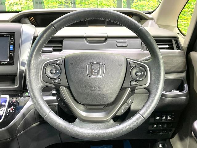 フリードハイブリッド ハイブリッド・EX 両側電動ドア 純正SDナビ バックカメラ 衝突被害軽減システム レーダークルーズ 禁煙車 ハーフレザーシート ドラレコ スマートキー LEDヘッド ビルトインETC 車線逸脱警報 オートライト(12枚目)