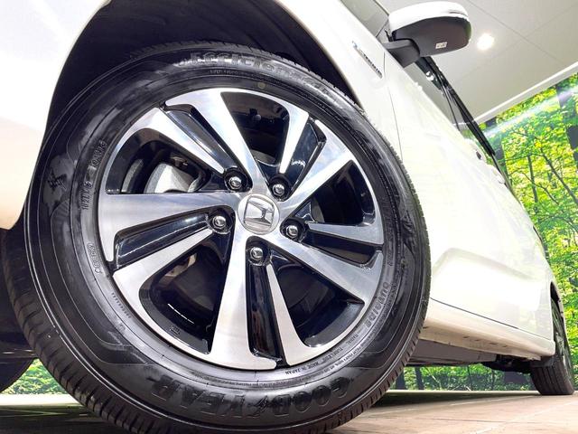 フリードハイブリッド ハイブリッド・EX 両側電動ドア 純正SDナビ バックカメラ 衝突被害軽減システム レーダークルーズ 禁煙車 ハーフレザーシート ドラレコ スマートキー LEDヘッド ビルトインETC 車線逸脱警報 オートライト(14枚目)