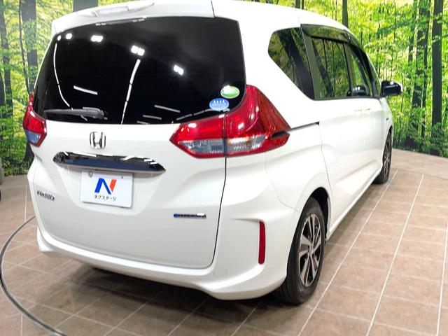 フリードハイブリッド ハイブリッド・EX 両側電動ドア 純正SDナビ バックカメラ 衝突被害軽減システム レーダークルーズ 禁煙車 ハーフレザーシート ドラレコ スマートキー LEDヘッド ビルトインETC 車線逸脱警報 オートライト(17枚目)