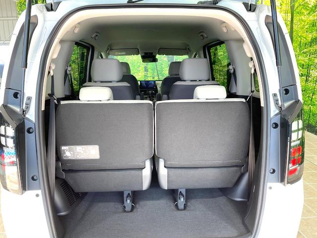 フリード エアー 登録済未使用車 両側電動ドア 純正9型ナビ バックカメラ 衝突被害軽減システム レーダークルーズ コーナーセンサー スマートキー LEDヘッド オートハイビーム 車線逸脱警報 オートライト(11枚目)