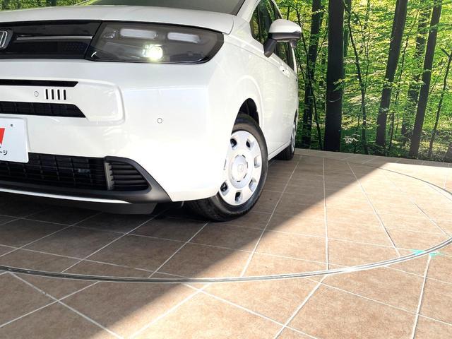 フリード エアー 登録済未使用車 両側電動ドア 純正9型ナビ バックカメラ 衝突被害軽減システム レーダークルーズ コーナーセンサー スマートキー LEDヘッド オートハイビーム 車線逸脱警報 オートライト(13枚目)