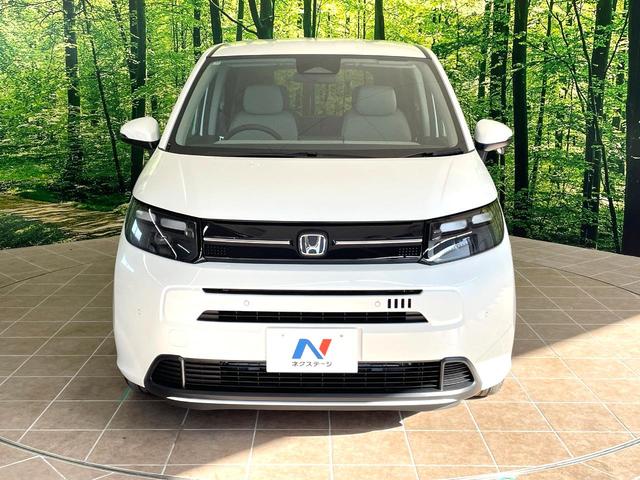 フリード エアー 登録済未使用車 両側電動ドア 純正9型ナビ バックカメラ 衝突被害軽減システム レーダークルーズ コーナーセンサー スマートキー LEDヘッド オートハイビーム 車線逸脱警報 オートライト(15枚目)