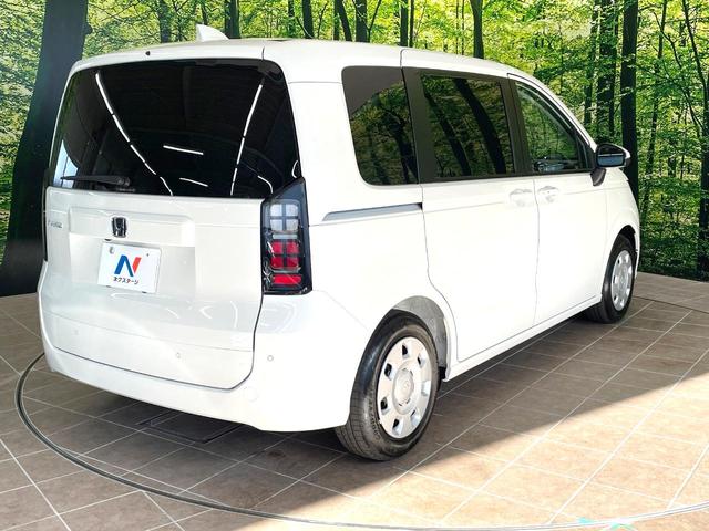 フリード エアー 登録済未使用車 両側電動ドア 純正9型ナビ バックカメラ 衝突被害軽減システム レーダークルーズ コーナーセンサー スマートキー LEDヘッド オートハイビーム 車線逸脱警報 オートライト(17枚目)