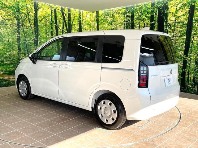 フリード エアー 登録済未使用車 両側電動ドア 純正9型ナビ バックカメラ 衝突被害軽減システム レーダークルーズ コーナーセンサー スマートキー LEDヘッド オートハイビーム 車線逸脱警報 オートライト(31枚目)