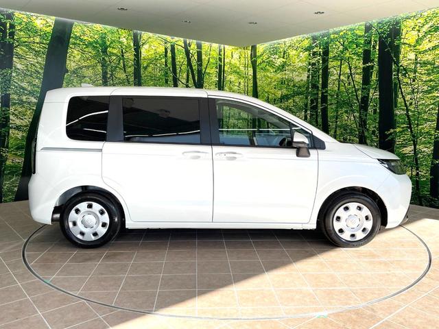 フリード エアー 登録済未使用車 両側電動ドア 純正9型ナビ バックカメラ 衝突被害軽減システム レーダークルーズ コーナーセンサー スマートキー LEDヘッド オートハイビーム 車線逸脱警報 オートライト(32枚目)