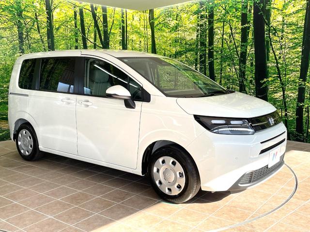 フリード エアー 登録済未使用車 両側電動ドア 純正9型ナビ バックカメラ 衝突被害軽減システム レーダークルーズ コーナーセンサー スマートキー LEDヘッド オートハイビーム 車線逸脱警報 オートライト(33枚目)