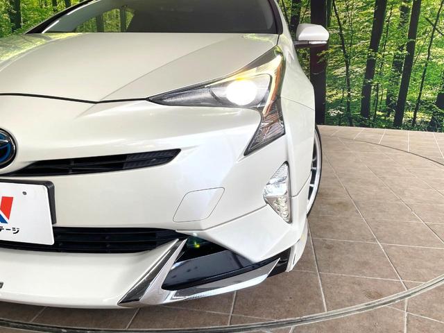 プリウス Ｓツーリングセレクション　フルエアロ　純正ＳＤナビ　バックカメラ　衝突被害軽減システム　レーダークルーズ　禁煙車　レザー調シート　コーナーセンサー　ＬＥＤヘッド　ビルトインＥＴＣ　オートハイビーム　車線逸脱警報　オートライト（12枚目）