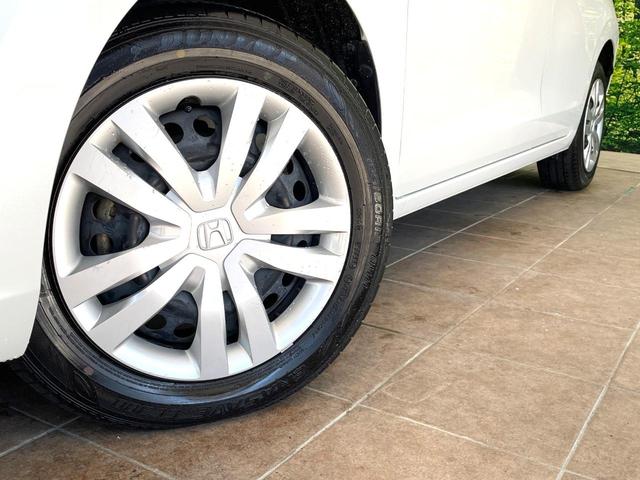 フィット ｅ：ＨＥＶホーム　ＳＤナビ　バックカメラ　衝突被害軽減システム　禁煙車　ハーフレザーシート　コーナーセンサー　スマートキー　ＬＥＤヘッド　ＥＴＣ　オートハイビーム　車線逸脱警報　オートライト　オートエアコン（13枚目）