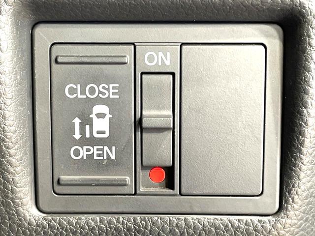 N-BOXカスタム G・EXホンダセンシング 4WD 電動スライドドア 純正SDナビ バックカメラ ホンダセンシング シートヒーター スマートキー LEDヘッド ETC 純正14インチアルミ オートライト オートエアコン Bluetooth(3枚目)