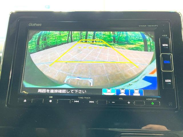 N-BOXカスタム G・EXホンダセンシング 4WD 電動スライドドア 純正SDナビ バックカメラ ホンダセンシング シートヒーター スマートキー LEDヘッド ETC 純正14インチアルミ オートライト オートエアコン Bluetooth(5枚目)