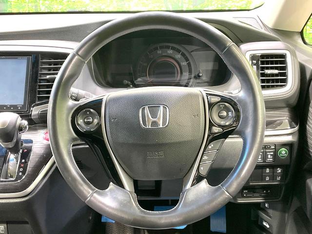 オデッセイ アブソルート・ＥＸ　両側電動ドア　純正８型ナビ　後席モニター　バックカメラ　ホンダセンシング　禁煙車　ハーフレザーシート　パワーシート　スマートキー　ＬＥＤヘッド　ビルトインＥＴＣ　純正１８インチアルミ（12枚目）
