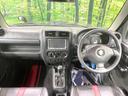 ジムニー ワイルドウインド 4WD ターボ SDナビ 禁煙車 合皮シート シートヒーター ルーフレール ETC 純正16インチアルミホイール CD DVD再生 フルセグ キーレス プライバシーガラス 衝突安全ボディ 中古車画像_2