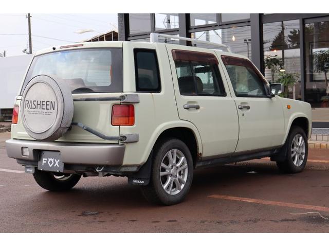 ラシーン タイプII 4WD ルーフレール 社外14インチAW シートリフター 背面タイヤ(10枚目)