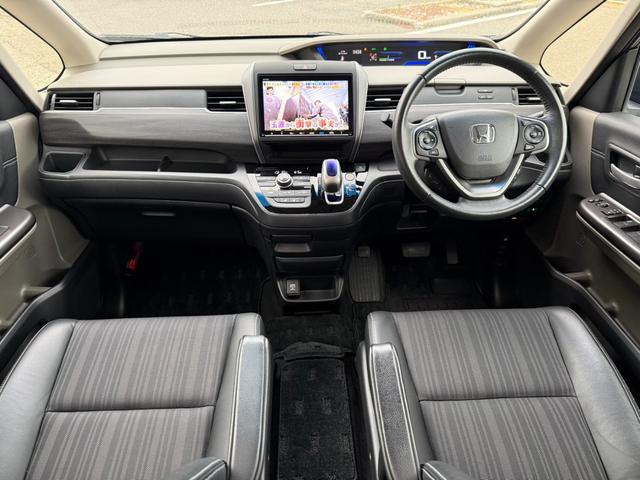 フリードハイブリッド ハイブリッド・Gホンダセンシング 関東仕入 4WD 雹害 純正9インチナビ フルセグTV BTオーディオ Bカメラ 両側パワスラ ウォークスルー シートヒーター アダプティブクルーズコントロール ホンダセンシング ハーフレザーシート(19枚目)