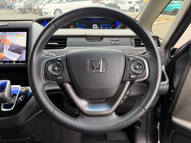 フリードハイブリッド ハイブリッド・Gホンダセンシング 関東仕入 4WD 雹害 純正9インチナビ フルセグTV BTオーディオ Bカメラ 両側パワスラ ウォークスルー シートヒーター アダプティブクルーズコントロール ホンダセンシング ハーフレザーシート(22枚目)