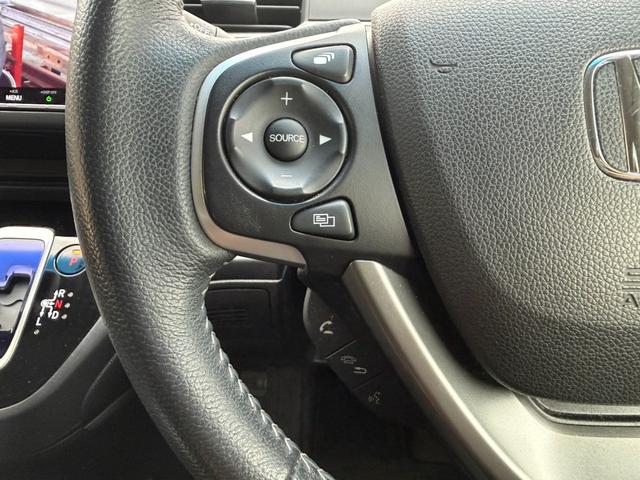 フリードハイブリッド ハイブリッド・Gホンダセンシング 関東仕入 4WD 雹害 純正9インチナビ フルセグTV BTオーディオ Bカメラ 両側パワスラ ウォークスルー シートヒーター アダプティブクルーズコントロール ホンダセンシング ハーフレザーシート(24枚目)