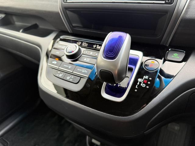 フリードハイブリッド ハイブリッド・Gホンダセンシング 関東仕入 4WD 雹害 純正9インチナビ フルセグTV BTオーディオ Bカメラ 両側パワスラ ウォークスルー シートヒーター アダプティブクルーズコントロール ホンダセンシング ハーフレザーシート(30枚目)