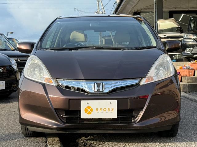 フィットハイブリッド ハイブリッド・10thアニバーサリー 10周年記念車 東海仕入 ナビTV Bluetooth スマートキー ディスチャージヘッドライト クルコン 純正アルミ(3枚目)