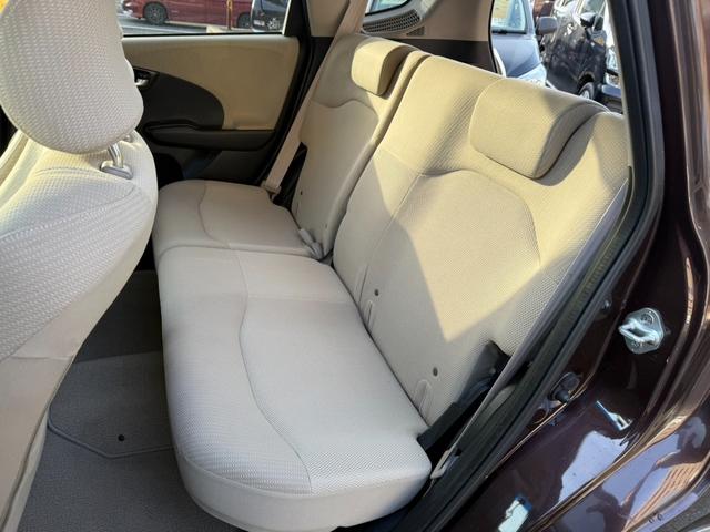 フィットハイブリッド ハイブリッド・10thアニバーサリー 10周年記念車 東海仕入 ナビTV Bluetooth スマートキー ディスチャージヘッドライト クルコン 純正アルミ(12枚目)