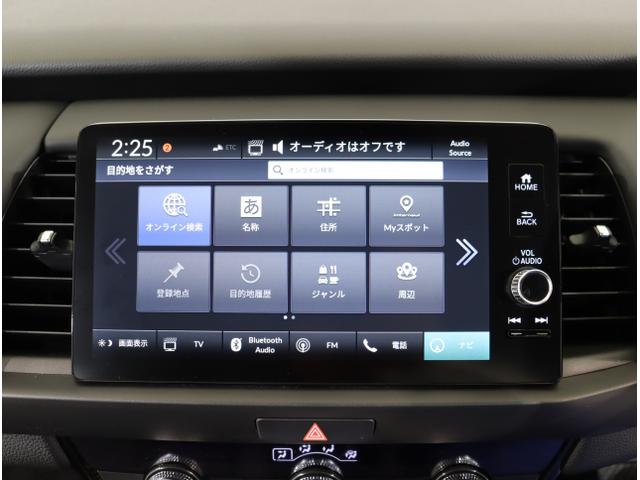 フィット ｅ：ＨＥＶホーム　ＨｏｎｄａＳＥＮＳＩＮＧＭナビＲカメラＥＴＣ　踏み間違い防止　サイドエアバッグ　ＬＥＤヘッド　マルチビューカメラ　クルーズコントロール　オートエアコン　横滑り防止機能　ＥＴＣ車載器　キーフリー　４ＷＤ（19枚目）