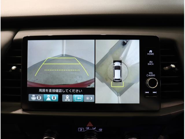 フィット ｅ：ＨＥＶホーム　ＨｏｎｄａＳＥＮＳＩＮＧＭナビＲカメラＥＴＣ　踏み間違い防止　サイドエアバッグ　ＬＥＤヘッド　マルチビューカメラ　クルーズコントロール　オートエアコン　横滑り防止機能　ＥＴＣ車載器　キーフリー　４ＷＤ（23枚目）