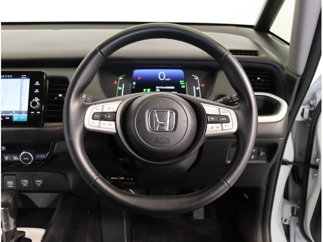 ｅ：ＨＥＶホーム　ＨｏｎｄａＳＥＮＳＩＮＧコネクトディスプレーＥＴＣＬＥＤライト　踏み間違い防止　サイドエアバッグ　ＬＥＤヘッド　マルチビューカメラ　クルーズコントロール　オートエアコン　ドライブレコーダー　キーフリー(16枚目)