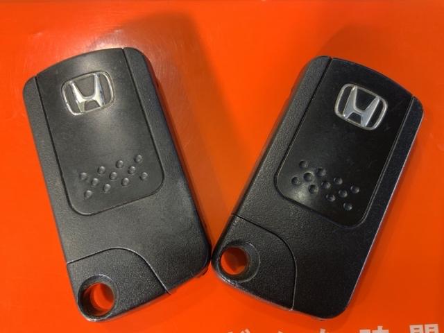 フリード Gジャストセレクション エアバッグ 記録簿 Sキー 盗難防止システム フルタイム4WD DVD再生 Bカメラ 3列シート パワーウィンドウ フルセグTV ESC 助手席エアバック キーレスエントリー(31枚目)