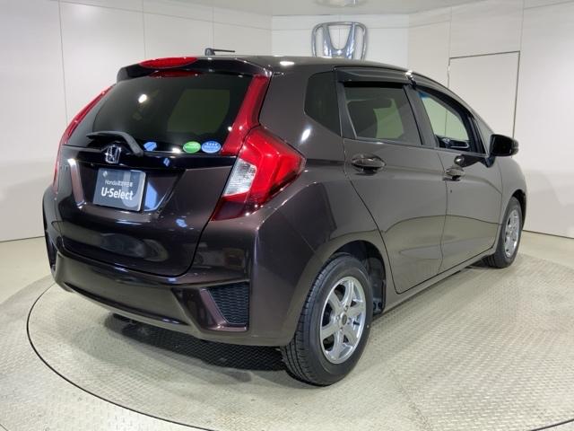 フィット １３Ｇ・Ｆパッケージコンフォートエディション　リヤビューカメラ　ＤＶＤ再生　シ－トヒ－タ－　ＶＳＡ　地デジフルセグ　ＡＵＴＯエアコン　キーレスエントリー　ＡＢＳ　エアバッグ　パワーウインドウ　記録簿（7枚目）