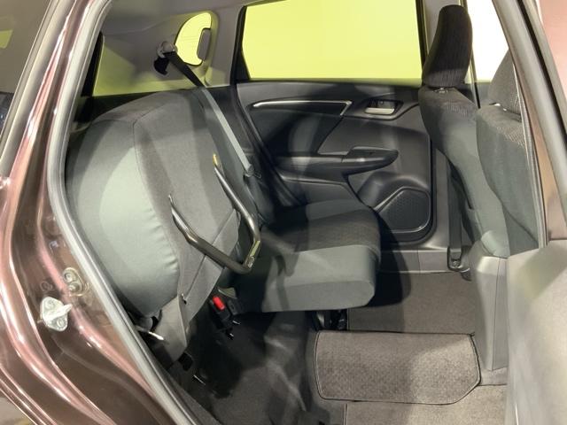 フィット １３Ｇ・Ｆパッケージコンフォートエディション　リヤビューカメラ　ＤＶＤ再生　シ－トヒ－タ－　ＶＳＡ　地デジフルセグ　ＡＵＴＯエアコン　キーレスエントリー　ＡＢＳ　エアバッグ　パワーウインドウ　記録簿（18枚目）