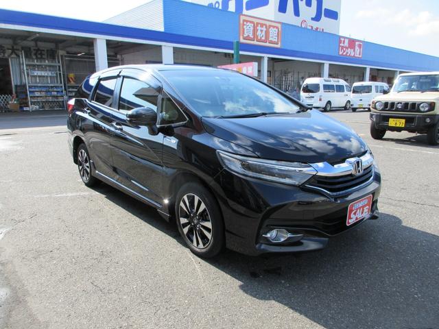 シャトル ハイブリッドＸ　４ＷＤ　純正インターナビ　フルセグＴＶ　バックカメラ　ホンダセンシング　キーフリープッシュスタート　クルーズコントロール　ＬＥＤヘッドライト　ビルトインＥＴＣ　純正１５インチアルミホイール（6枚目）