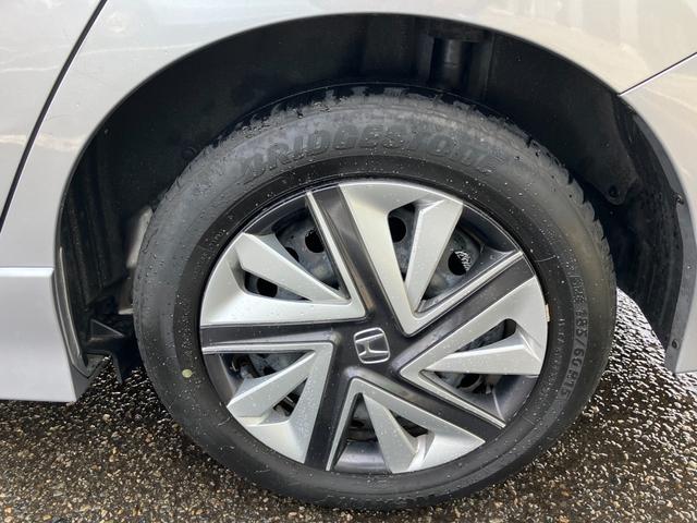 シャトル ハイブリッド　ホンダセンシング　社外ナビ　バックカメラ　ＥＴＣ　アダプティブクルーズコントロール　プッシュスタート　スマートキー　夏タイヤ４本新品交換　衝突被害軽減装置　アイドリングストップ　電動格納ドアミラー（54枚目）