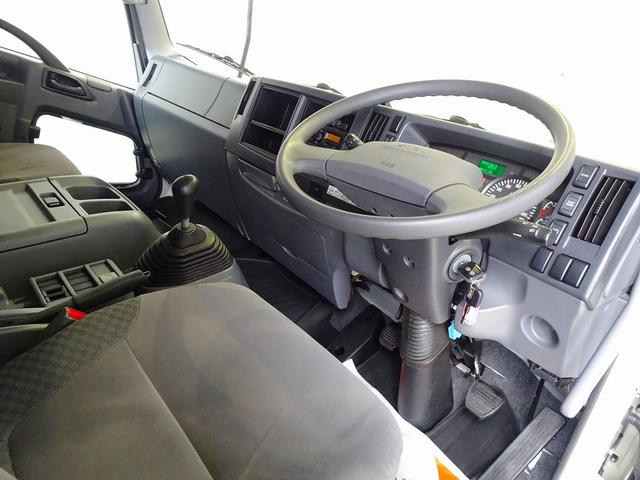 フォワード 　３．８５ｔ　ワイドべッドレス　平ボデー　三方開　アルミアオリ　左右セイコーラック　リア支柱脱着可　前立て鳥居アルミ縞鋼板張り　横ねた２２本（5枚目）