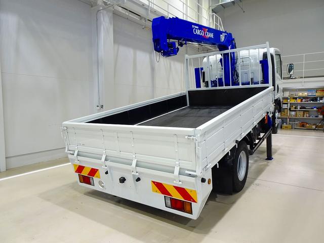 エルフトラック 高床　３．５ｔ　ワイドロング　タダノ４段　２．９ｔ吊りセルフクレーン付　Ｈ１３年製　ラジコン／フックイン付　三方開　床板アピトン張替え（２０ｍｍ）　リアブル積み加工　横ねた１９本／チャンネル増し８本（3枚目）