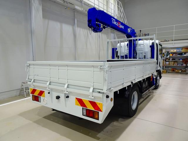 エルフトラック 高床　３．５ｔ　ワイドロング　タダノ４段　２．９ｔ吊りセルフクレーン付　Ｈ１３年製　ラジコン／フックイン付　三方開　床板アピトン張替え（２０ｍｍ）　リアブル積み加工　横ねた１９本／チャンネル増し８本（7枚目）