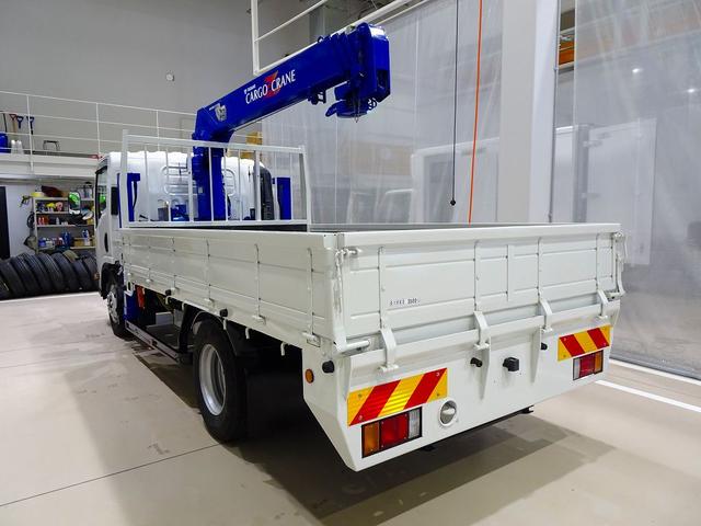 エルフトラック 高床　３．５ｔ　ワイドロング　タダノ４段　２．９ｔ吊りセルフクレーン付　Ｈ１３年製　ラジコン／フックイン付　三方開　床板アピトン張替え（２０ｍｍ）　リアブル積み加工　横ねた１９本／チャンネル増し８本（8枚目）