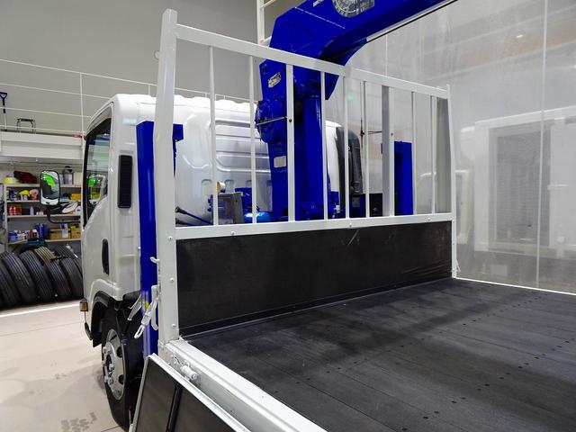 エルフトラック 高床　３．５ｔ　ワイドロング　タダノ４段　２．９ｔ吊りセルフクレーン付　Ｈ１３年製　ラジコン／フックイン付　三方開　床板アピトン張替え（２０ｍｍ）　リアブル積み加工　横ねた１９本／チャンネル増し８本（24枚目）