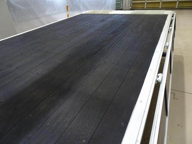 エルフトラック 高床　３．５ｔ　ワイドロング　タダノ４段　２．９ｔ吊りセルフクレーン付　Ｈ１３年製　ラジコン／フックイン付　三方開　床板アピトン張替え（２０ｍｍ）　リアブル積み加工　横ねた１９本／チャンネル増し８本（28枚目）