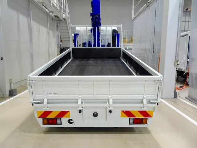 エルフトラック 高床　３．５ｔ　ワイドロング　タダノ４段　２．９ｔ吊りセルフクレーン付　Ｈ１３年製　ラジコン／フックイン付　三方開　床板アピトン張替え（２０ｍｍ）　リアブル積み加工　横ねた１９本／チャンネル増し８本（31枚目）