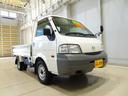 ボンゴトラック DX 1t 4WD(切替式) ワイドロー Wタイヤ 平ボデー ガソリン 三方開 スチールボディ 鳥居作業灯1個 リアアオリチェーン2個 集中ドアロック 左ミラー電動角度調整 中古車画像_2