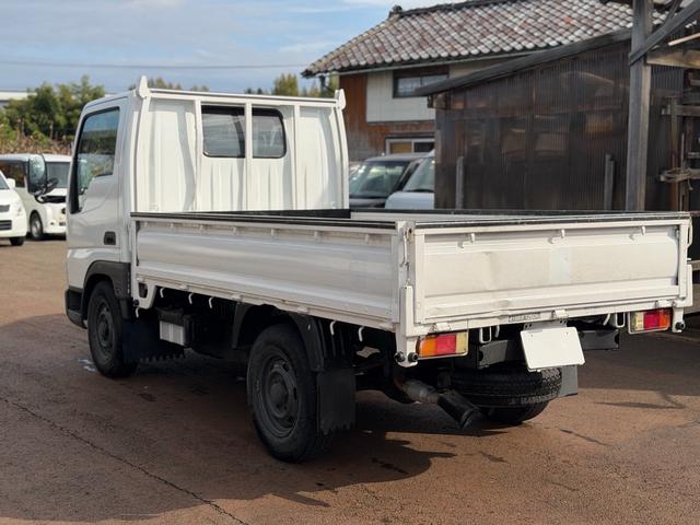 タイタンダッシュ シングルワイドローＤＸ　車検Ｒ８年４月まで　切り替え４ＷＤ　ＭＴ　純正オーディオ　電動格納ミラー　エアコン　パワーステアリング　ＨＩＤヘッドライト　ＥＴＣ車載器　シングルタイヤ　新免許対応車（6枚目）