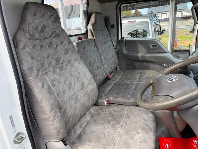 タイタンダッシュ シングルワイドローＤＸ　車検Ｒ８年４月まで　切り替え４ＷＤ　ＭＴ　純正オーディオ　電動格納ミラー　エアコン　パワーステアリング　ＨＩＤヘッドライト　ＥＴＣ車載器　シングルタイヤ　新免許対応車（16枚目）