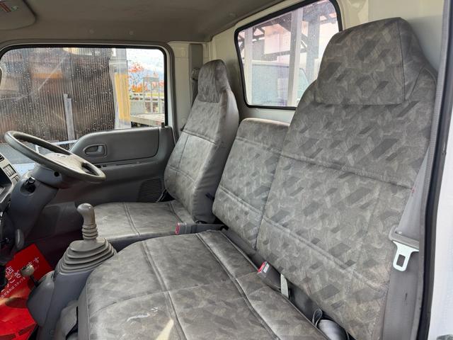 タイタンダッシュ シングルワイドローＤＸ　車検Ｒ８年４月まで　切り替え４ＷＤ　ＭＴ　純正オーディオ　電動格納ミラー　エアコン　パワーステアリング　ＨＩＤヘッドライト　ＥＴＣ車載器　シングルタイヤ　新免許対応車（20枚目）