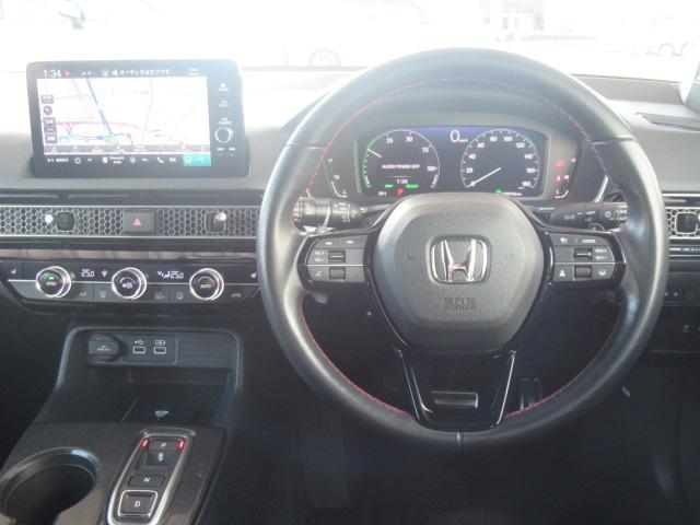 シビック ｅ：ＨＥＶ　盗難防止システム　クリアランスソナー　オートクルーズコントロール　地デジフルセグ　後カメラ　ＵＳＢポート　パワーステアリング　パワーシート　ＬＥＤライト　パワーウィンドウ　エアコン　ＡＢＳ（11枚目）