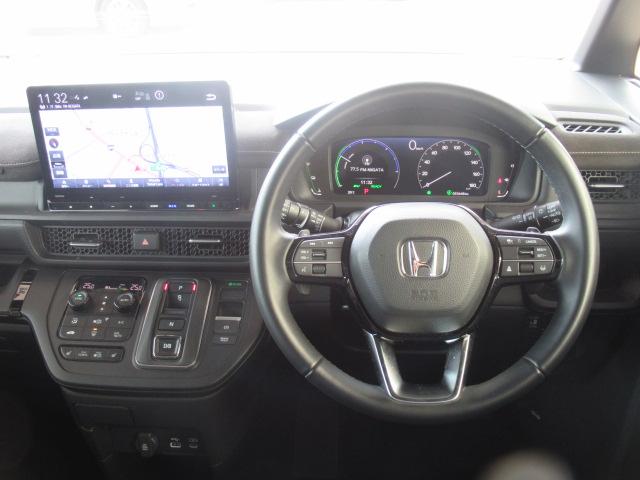 ステップワゴン e:HEVスパーダプレミアムライン マルチカメラ Pテールゲート Wエアコン 両側自動ドア Fセグ USB接続 クリアランスソナ クルーズC 助手席エアバッグ スマートK シ-トヒ-タ- DVD再生(11枚目)