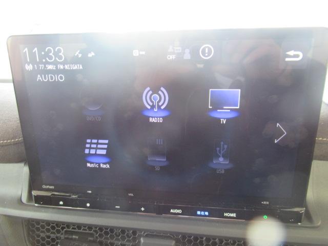 ステップワゴン e:HEVスパーダプレミアムライン マルチカメラ Pテールゲート Wエアコン 両側自動ドア Fセグ USB接続 クリアランスソナ クルーズC 助手席エアバッグ スマートK シ-トヒ-タ- DVD再生(14枚目)