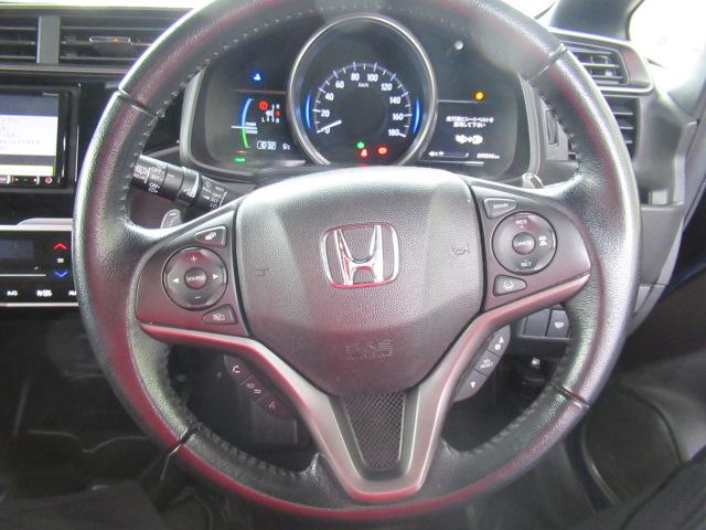 フィットハイブリッド Ｓホンダセンシング　スマ－トキ－　ナビＴＶ　禁煙　アクティブクルーズコントロール　パワーウインドウ　ドライブレコーダ　サイドエアバック　ＤＶＤ再生　パワーステアリング　ＬＥＤヘッドランプ　ＡＢＳ（9枚目）
