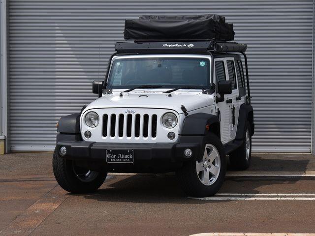 ジープ・ラングラーアンリミテッド スポーツ　４ＷＤ　スミティビルト製ルーフテント　オーニング　バハラックルーフキャリア　ナビＴＶ　バックカメラ　後期モデル　クルーズコントロール　背面タイヤカバー　サイドカメラ　キーレス　ＥＴＣ　ワンオーナー車（4枚目）